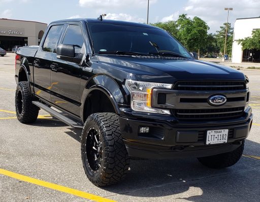 20x10 Black Milled Fuel Cleaver wheels with 35x12.5R20LT Nitto Ridge Grappler tires on a 2018 Ford F-150