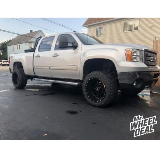20x12" RBP 65R Black -44mm wheels with 33X12.5R20LT Atturo Trail Blade MT tires on a 2014 GMC Sierra 3500HD
