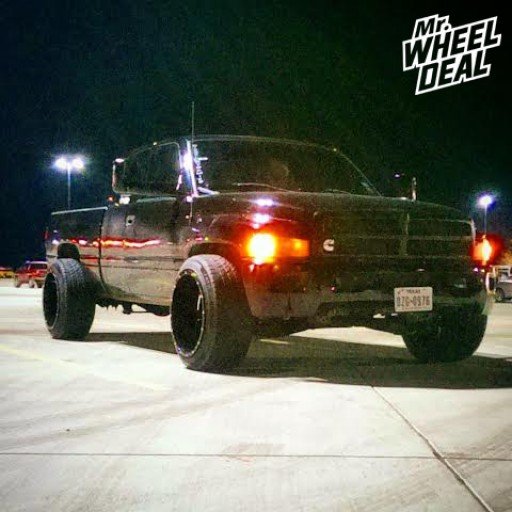 22x14" Black Moto Metal 962 wheels with 305/45/22 Ironman iMove tires on a 2002 Dodge Ram 2500 22x14 Moto Metal 962 Black wheels with 305/45/22 Ironman iMove tires on a 2002 Dodge Ram 2500