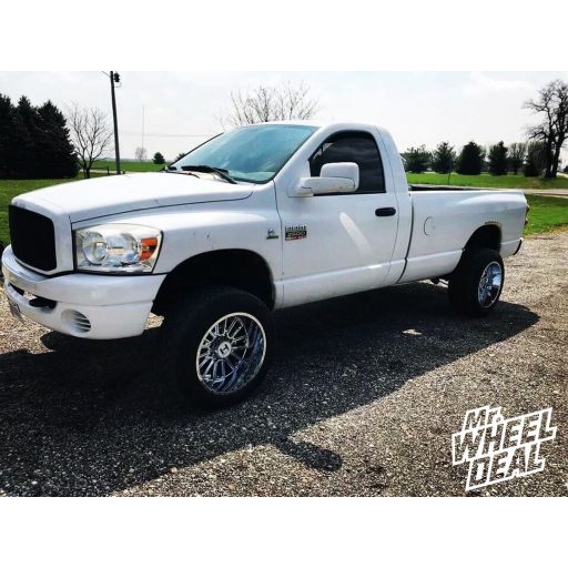 2007 Ram 2500 with 20x12 Chrome Hostile Predator wheels and 305/50R20 Nitto NT420S tires