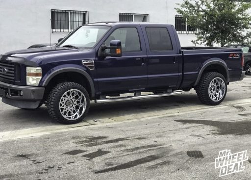 2008 Ford F-250 with 22x12 -51mm Chrome Vision Rocker wheels and 33x12.50R22LT Mileking MK878 RT tires