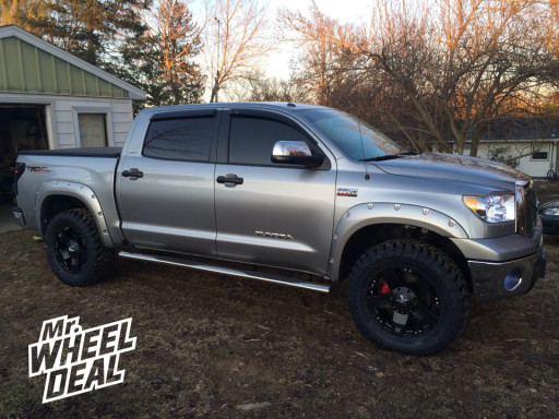 20x8.5" XD Rockstar Black Wheels with 35x12.50x20 Toyo Open Country MT Tires on a 2011 Toyota Tundra 20x8.5" XD Rockstar Black Wheels with 35x12.50x20 Toyo Open Country MT Tires on a 2011 Toyota Tundra