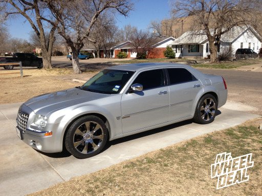 20x8.5" Helo HE874 Chrome wrapped in 275/40/20 Capitol Sport UHP Tires on a 2005 Chrysler 300C