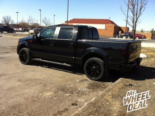 22" KMC Slide Black Wheels with 305/40/22 Nexen Roadian HP Tires on a 2012 Ford F-150