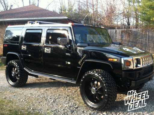 22x9.5" Milanni Kool Whip 8 Wheels with 325/50/22 Nitto Trail Grappler MT Tires on an '03 Hummer H2