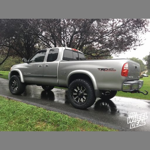 2005 Toyota Tundra with 20x9 Black Fuel Off-Road Hardline wheels and 305/55R20 Nitto Ridge Grappler tires