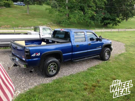 16x8 American Outlaw Buckshot Wheels on a 2003 GMC Sierra 2500 2003 GMC Sierra 2500 with 16x8 American Outlaw Buckshot Wheels