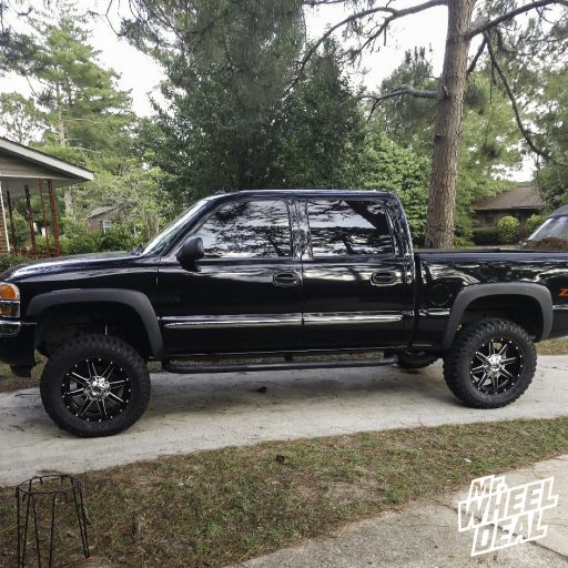 2005 GMC Sierra 1500 with 20x9 Fuel Maverick +1mm Black wheels and 35x12.50R20LT Kanati Trail Hog tires