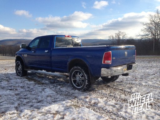 22x9.5" Milanni Kool Whip 8 Machined Black Wheels with 325/50/22 Nitto Trail Grappler Tires on a 2013 Dodge Ram 3500
